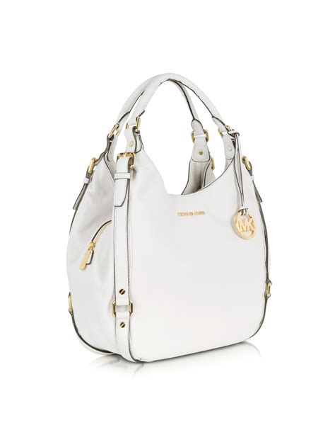 optic white michael kors bag|More.